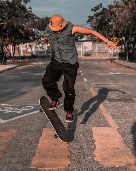 a man that is jumping in the air with a skateboard