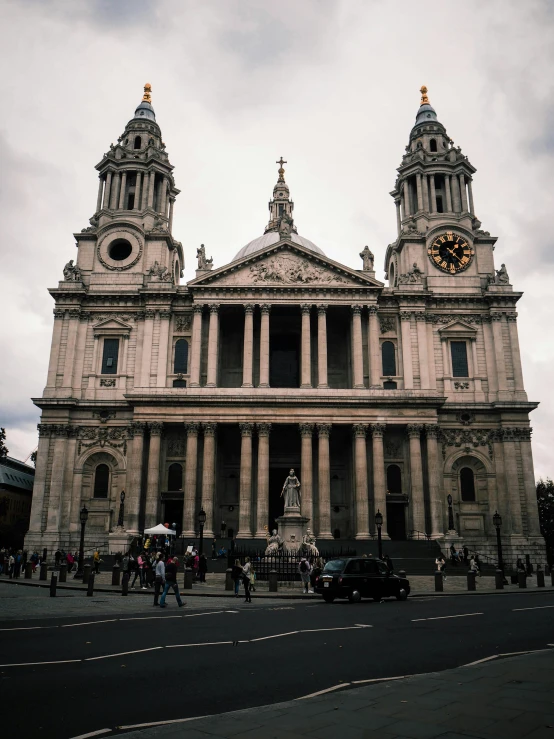 a large building with two towers that look like some buildings