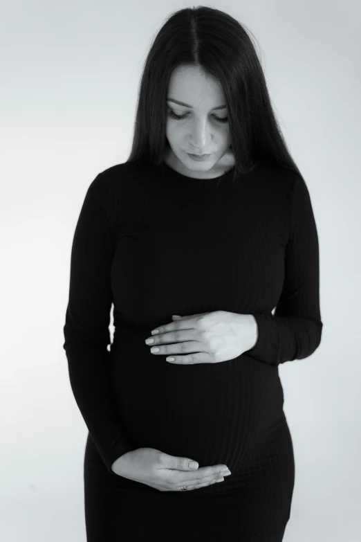 black and white pograph of a pregnant woman