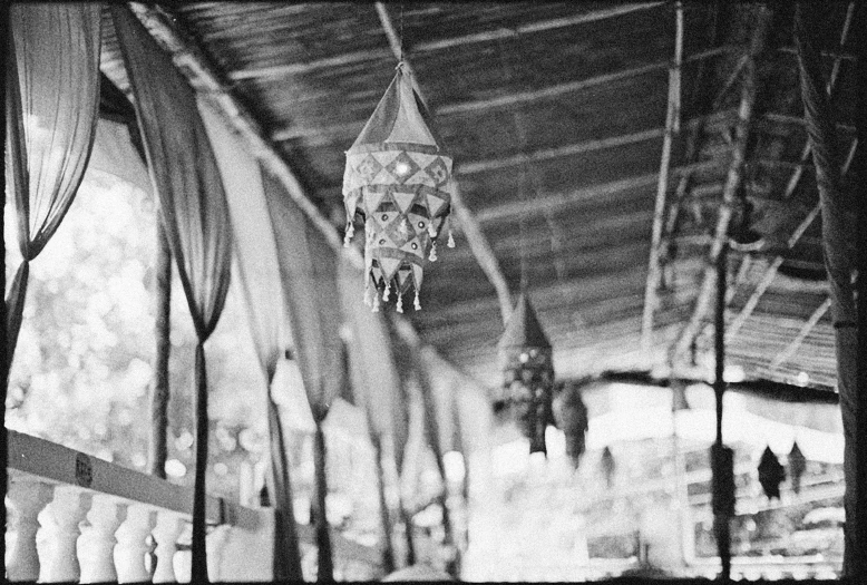 several hanging objects in the middle of a long row