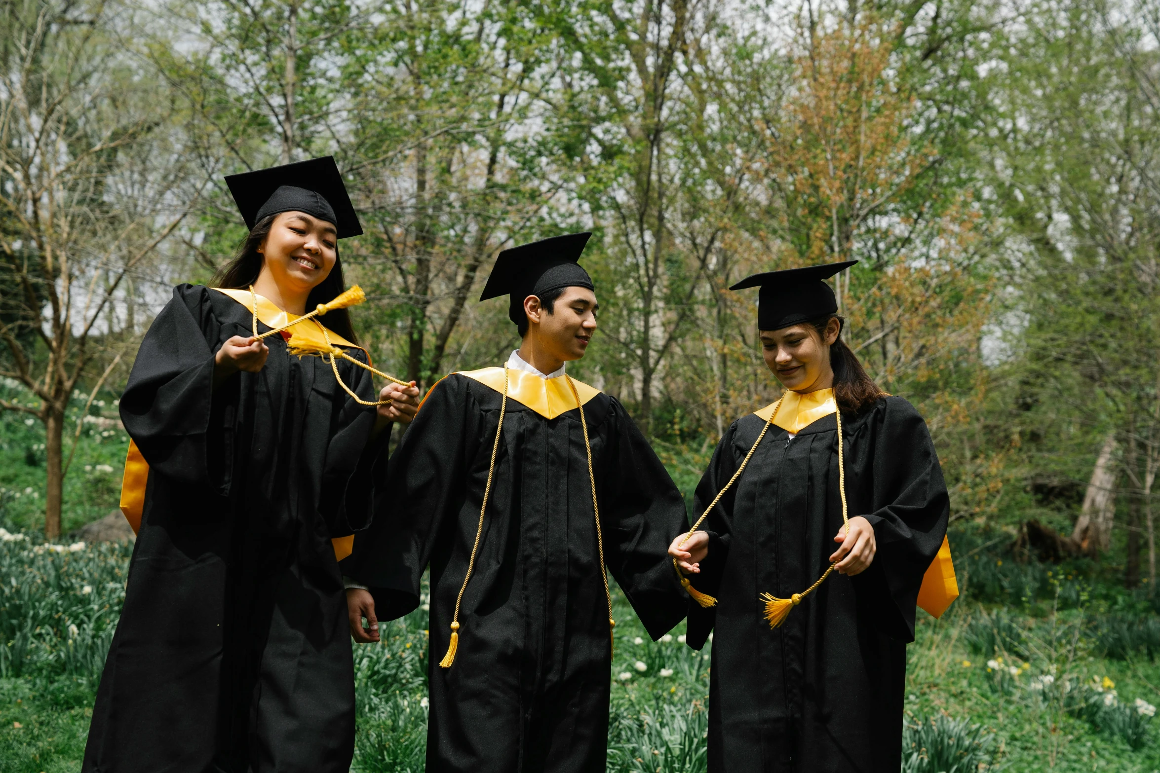 some graduates standing in line at graduation