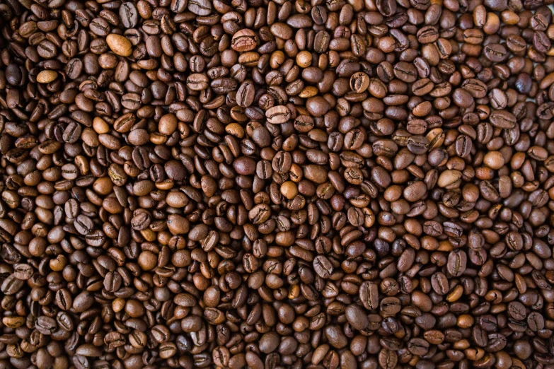 coffee beans arranged together in a pattern