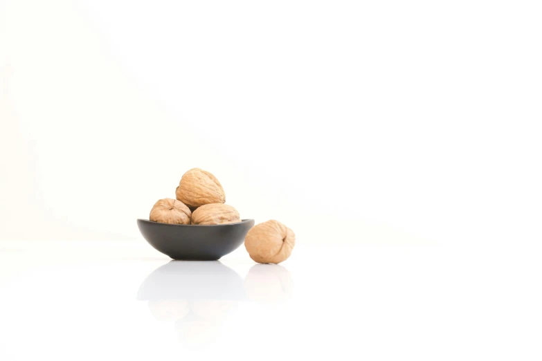 some sugared nuts are in a bowl