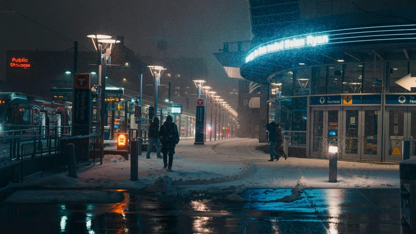 a couple walks down a street in the rain