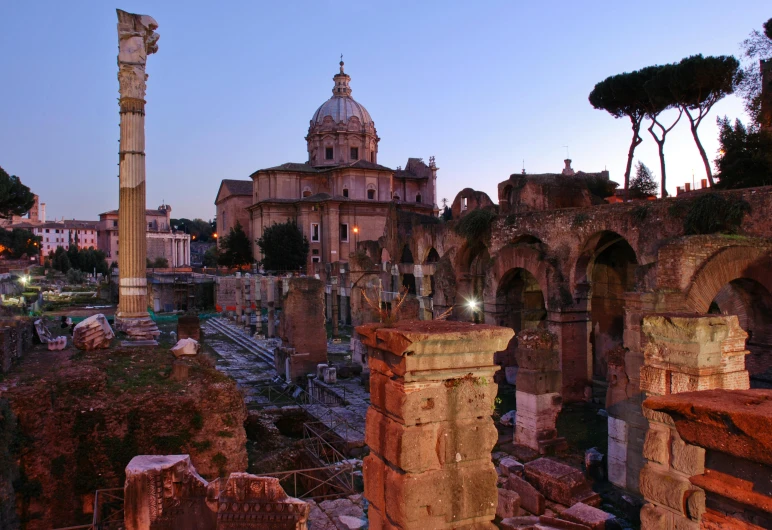 a view of ruins and ancient buildings from a distance