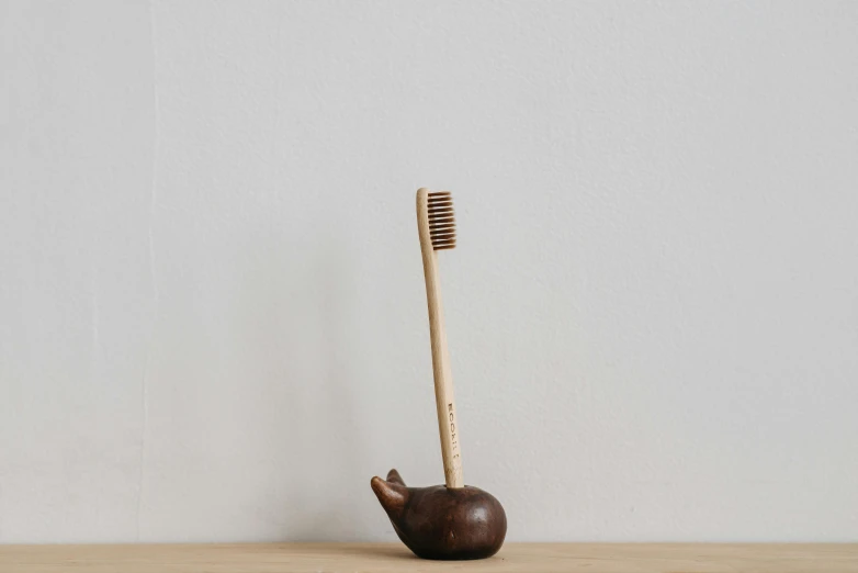 an image of a wooden tooth brush holder