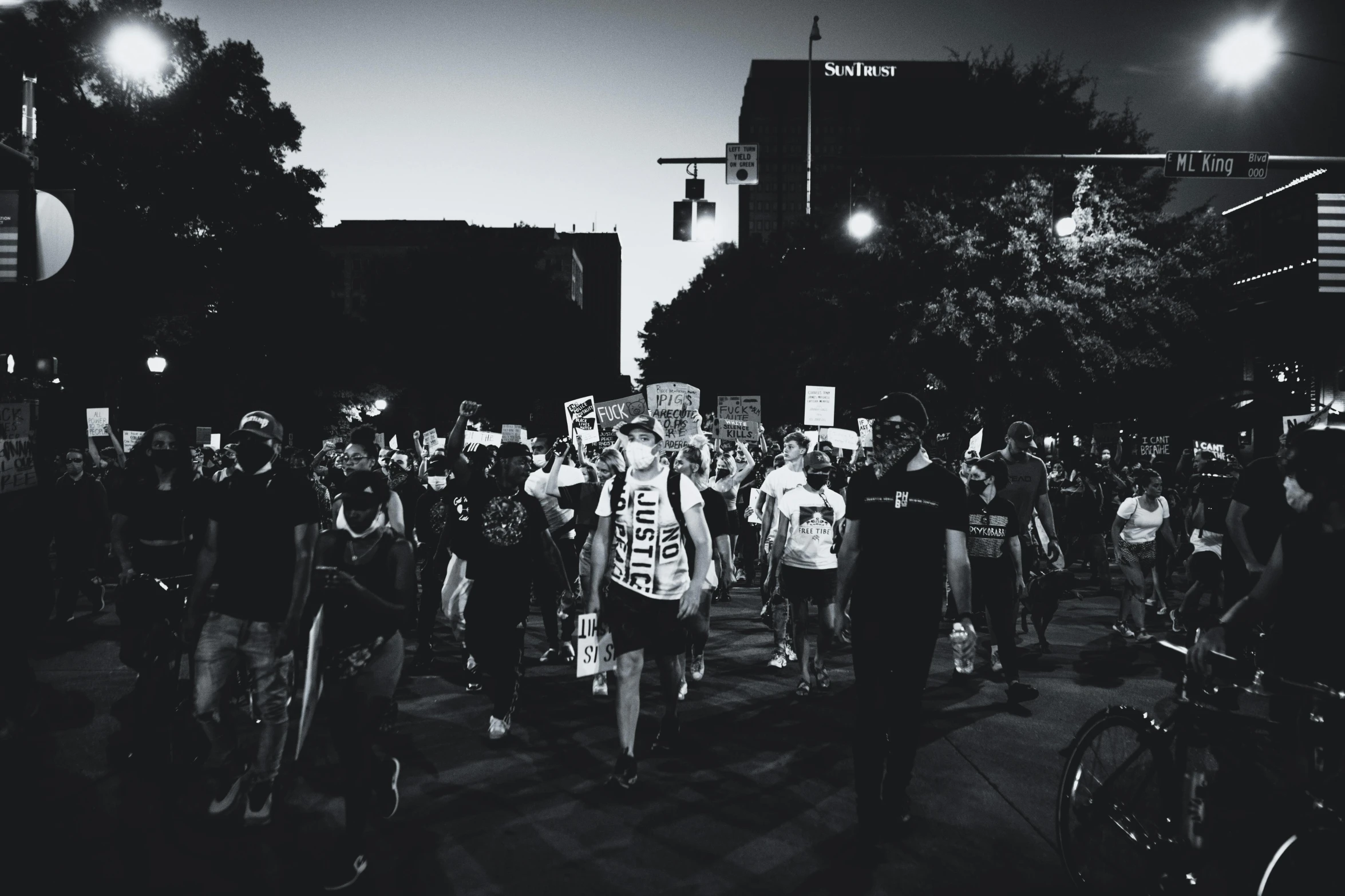 a crowd gathered in the street for a demonstration