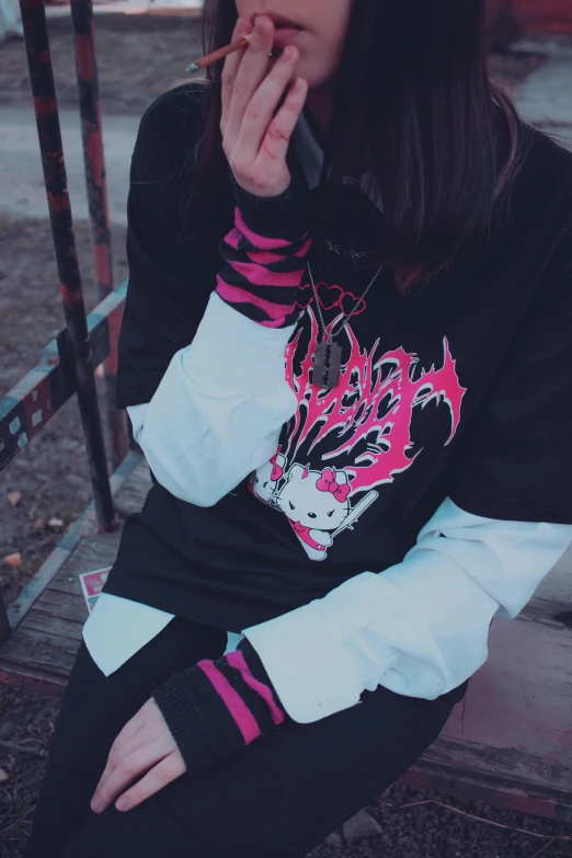 a young woman with long brown hair sitting on a bench