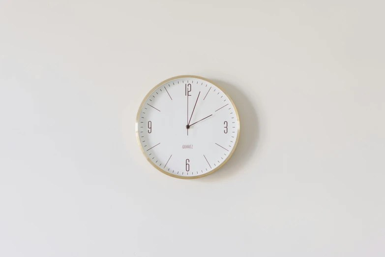 a clock sitting on the wall above it