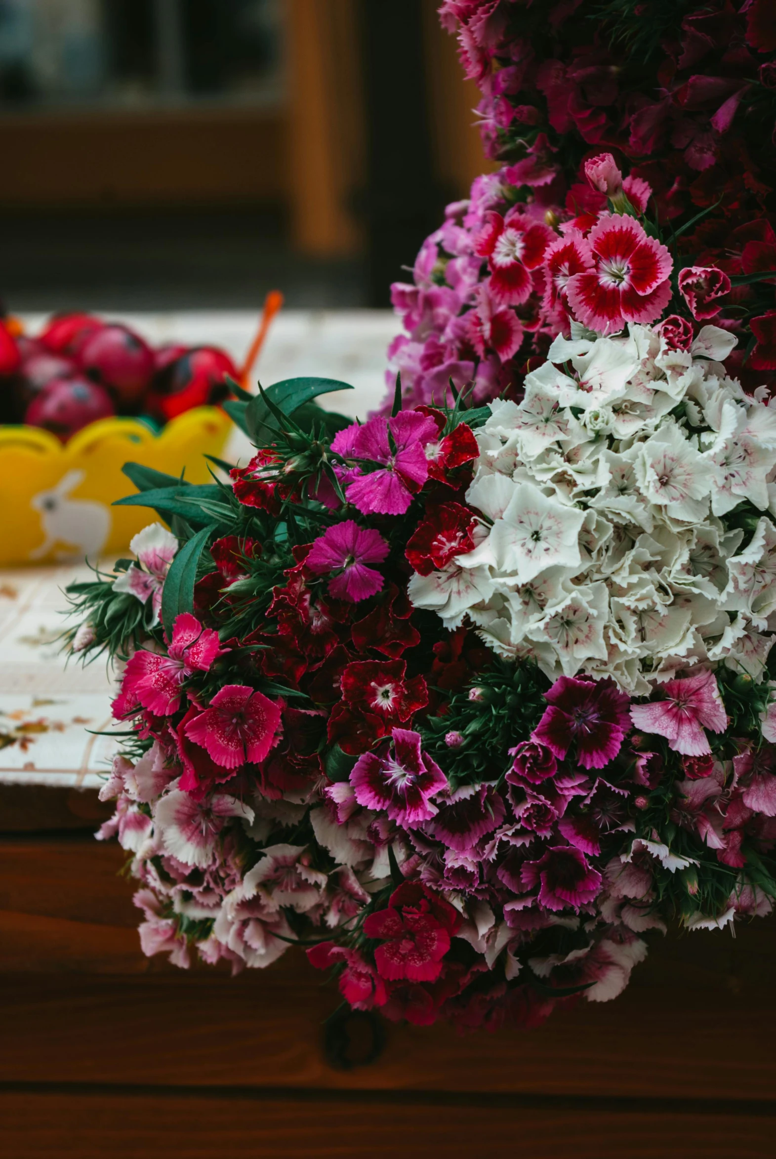 a variety of flowers are on a table