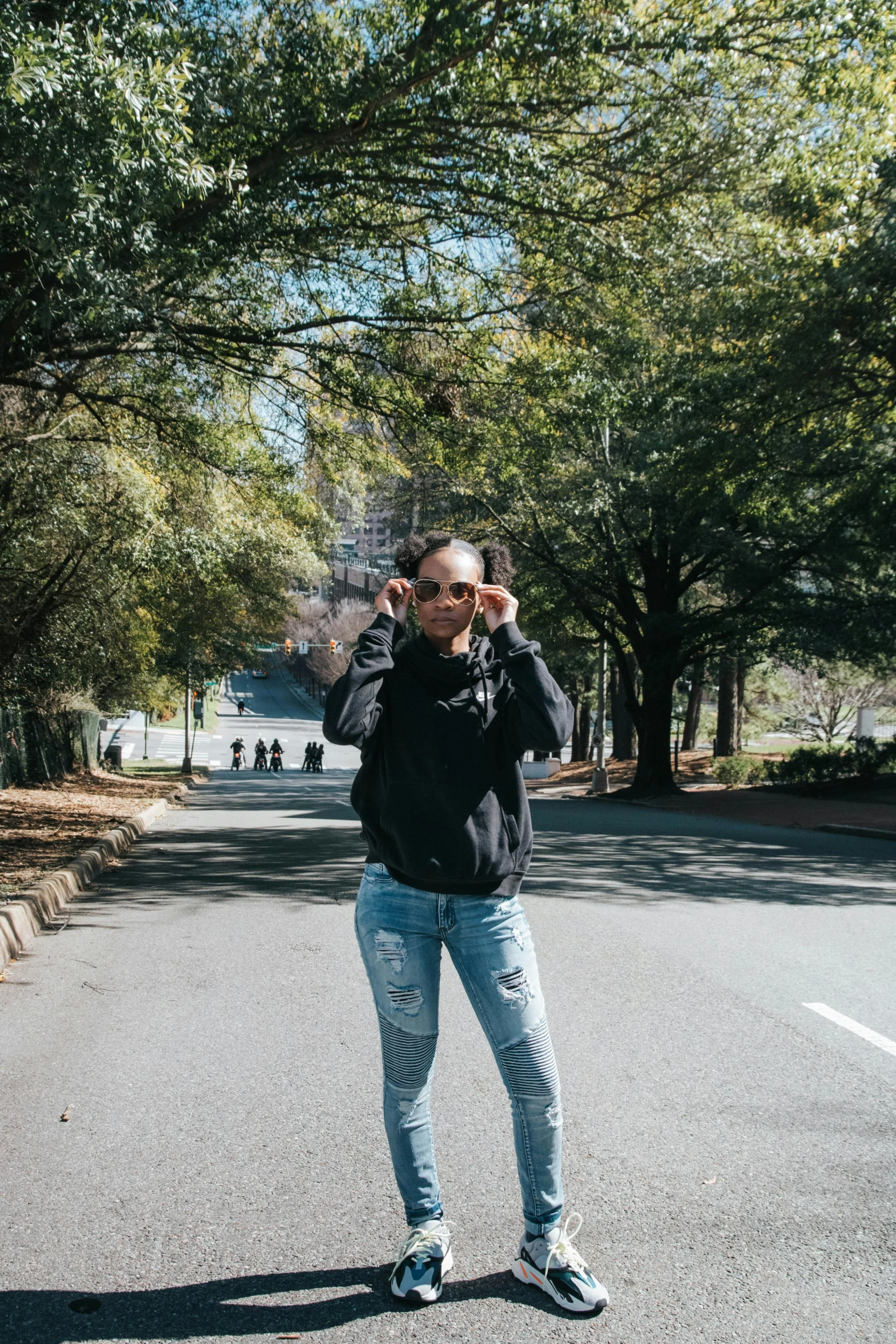 a man that is standing in the middle of the street