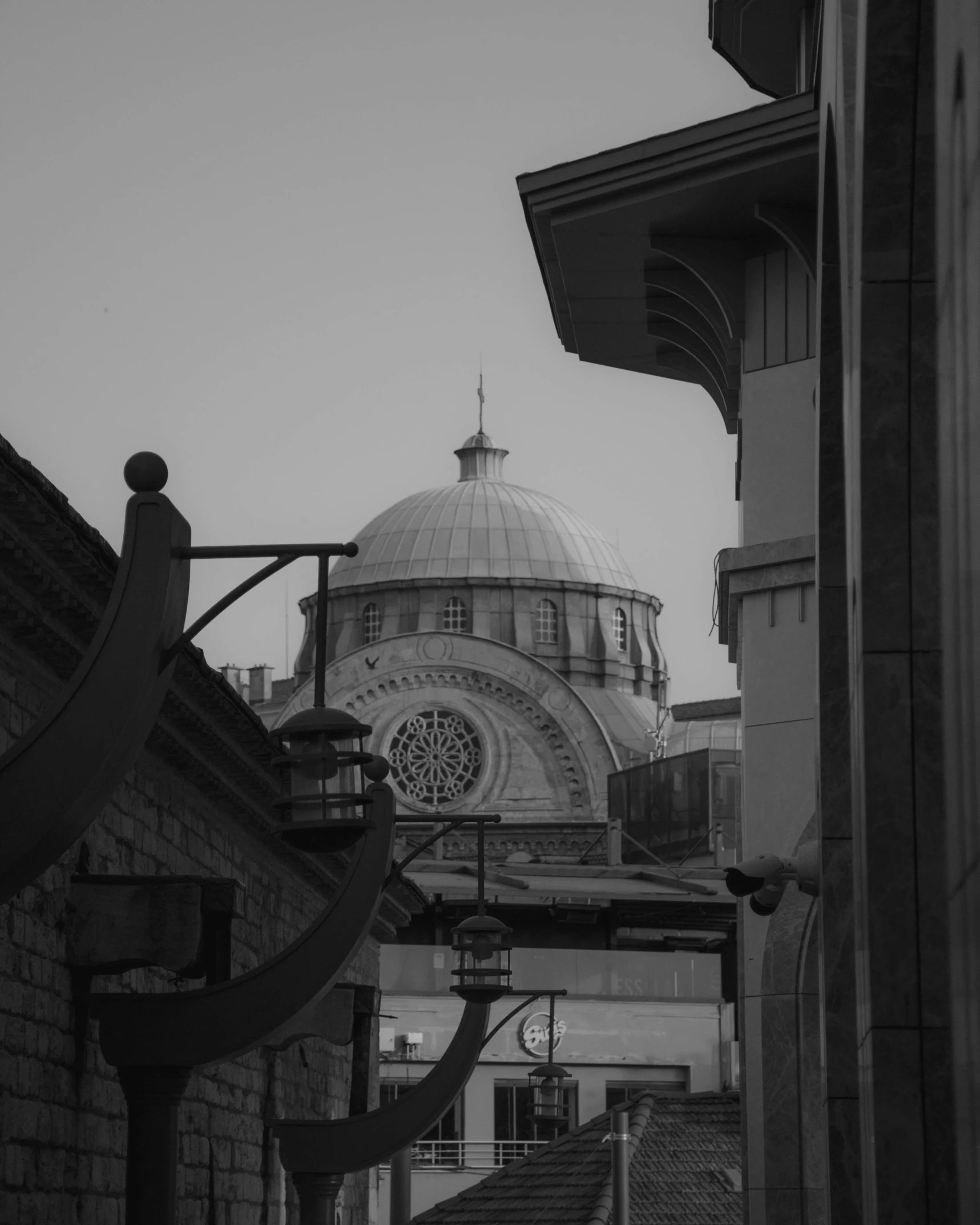 view from a side alley looking over the top of a building