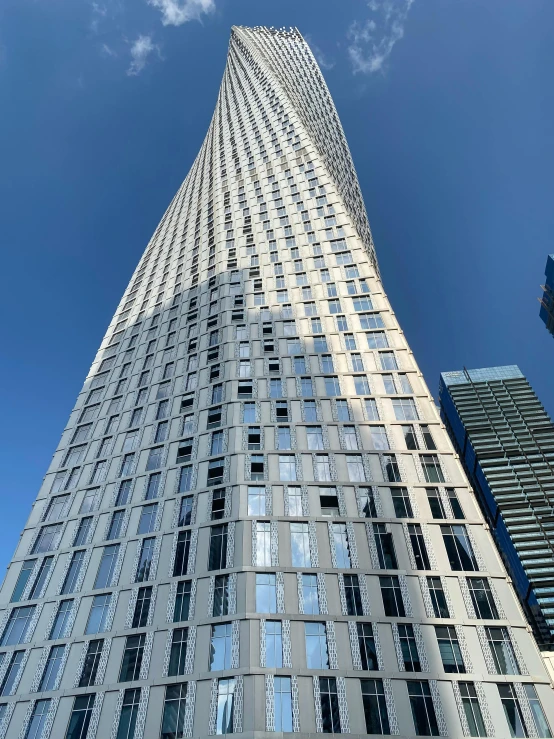 the sky is visible between two buildings on this clear day