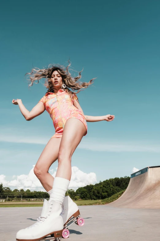 woman with flowing hair riding on top of a skateboard