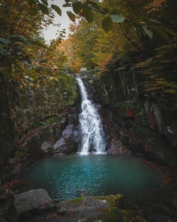 there is a waterfall at the end of the river