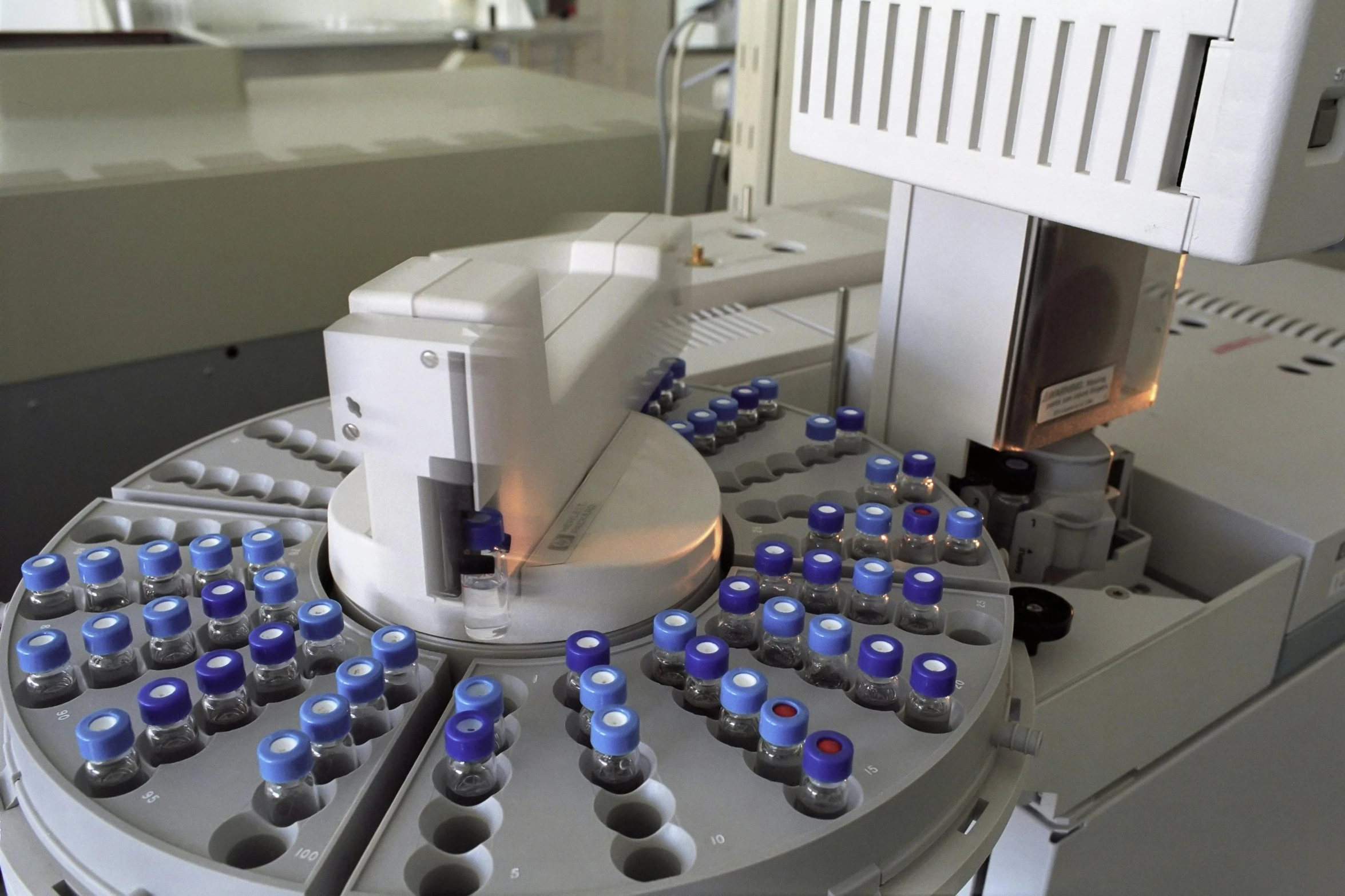 a machine is producing soda with blue ons