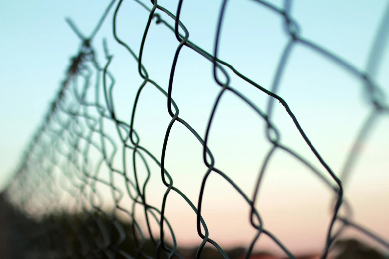 a fence is shown, and it looks like a wire with many wires connected to it