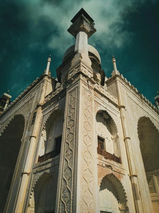 an ornately designed building with stone work