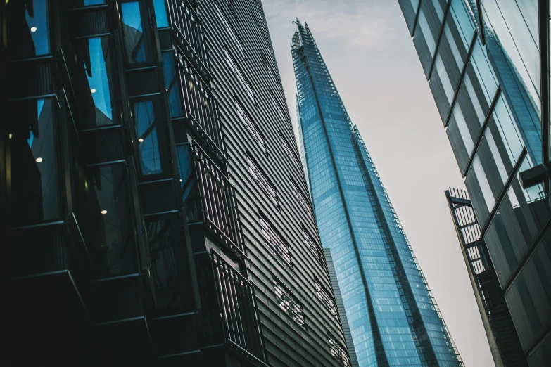 a view of several tall buildings in a city