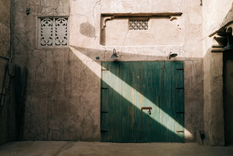 a door with a window in a tan walled wall