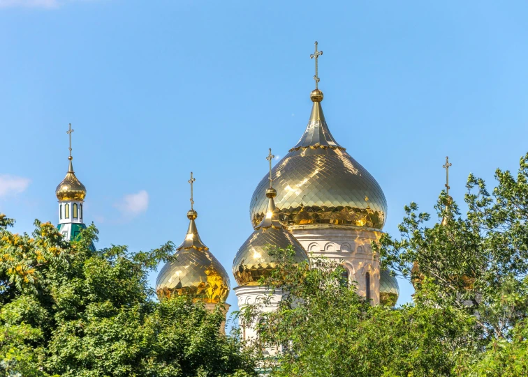 the domes on this building feature gold and gold