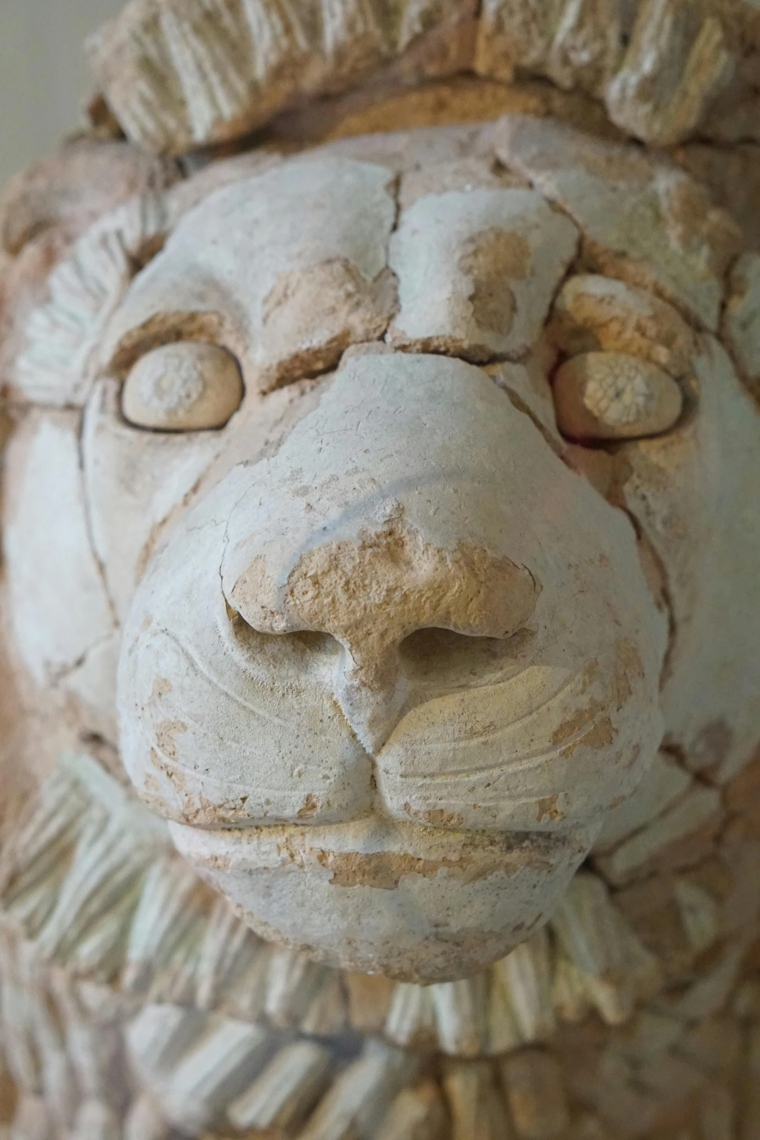 the stone sculpture has been carved into a lion's face