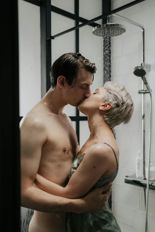 a  woman kissing her lover in the shower