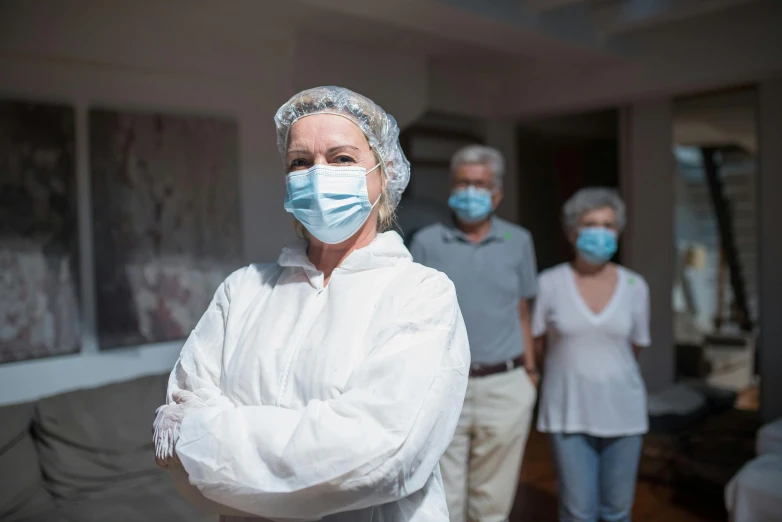 a group of people that are wearing face masks