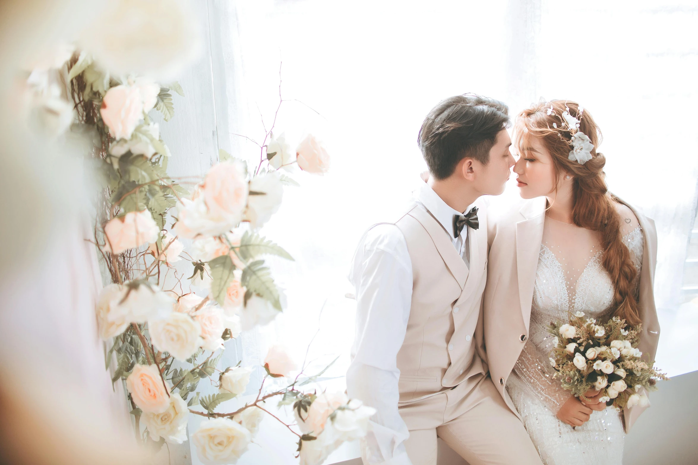 a bride and groom in the light light