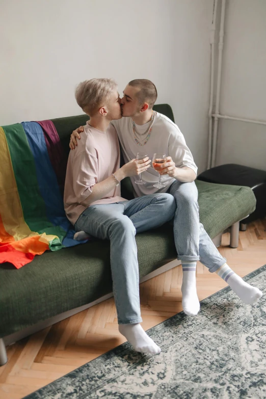 two older people on a couch in a room