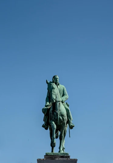 a statue with a man on top on a horse