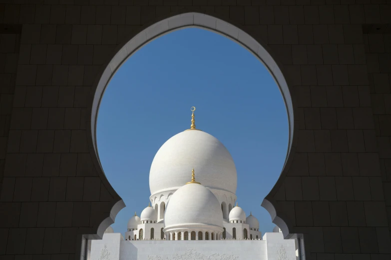 a building with a cross on top of it