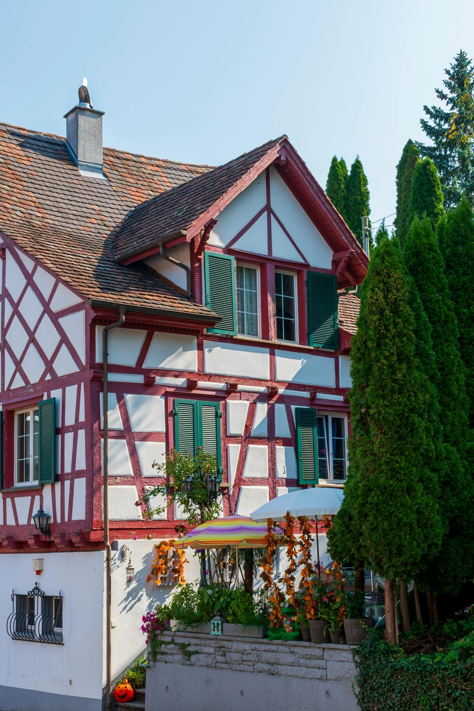 a house with red and white paint painted