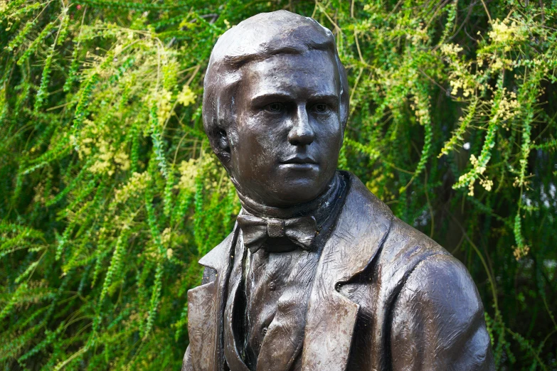 a statue of a man with a suit and tie