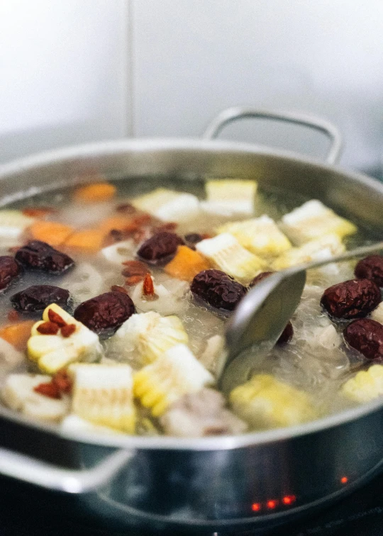 the food is being prepared on the stove