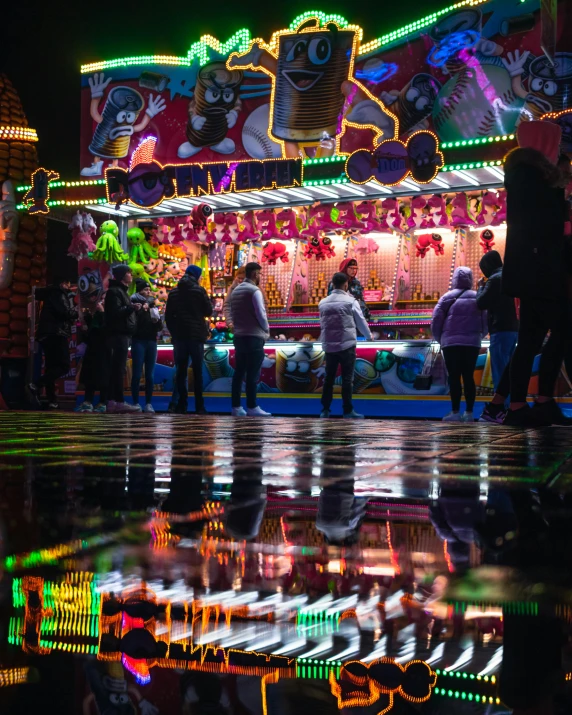 a christmas decorated merry go round with people and carousels