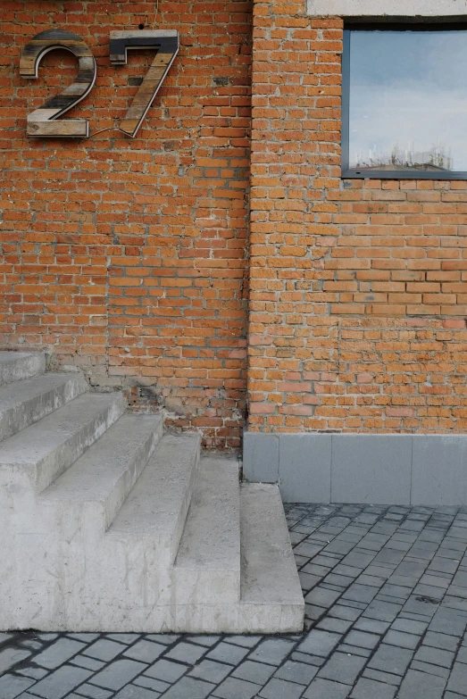 a man riding on a skateboard down some stairs