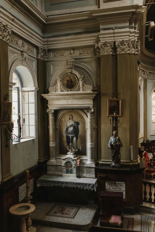 a large ornate room with a stone fire place