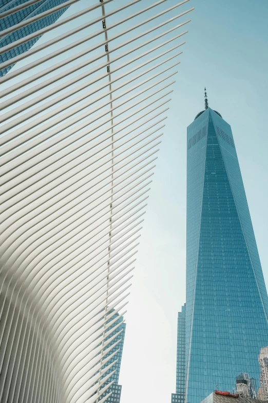 tall buildings standing next to each other on a sunny day