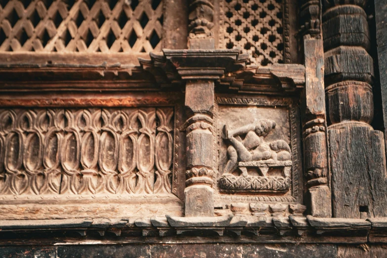 intricate carved and carved stone work on the side of an old building