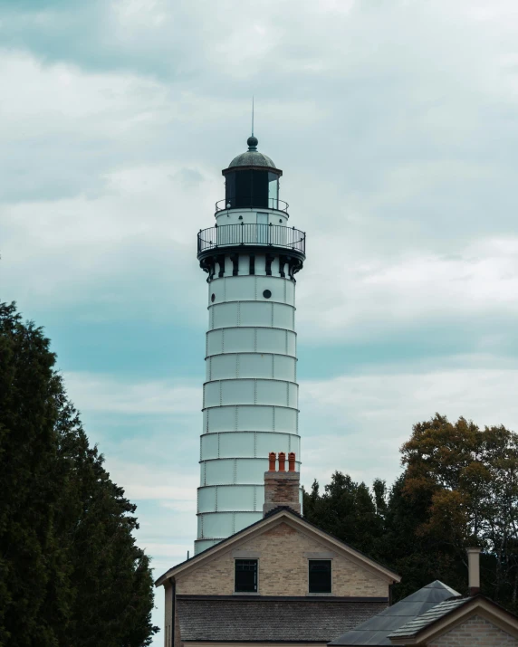 the building has many chimneys on the top of it