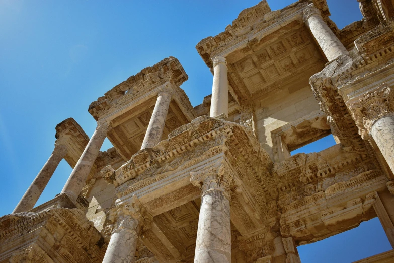 an old building with pillars on each side