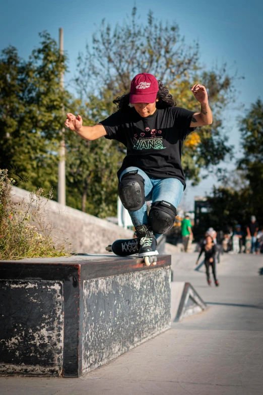 a boy is doing a trick on his skateboard