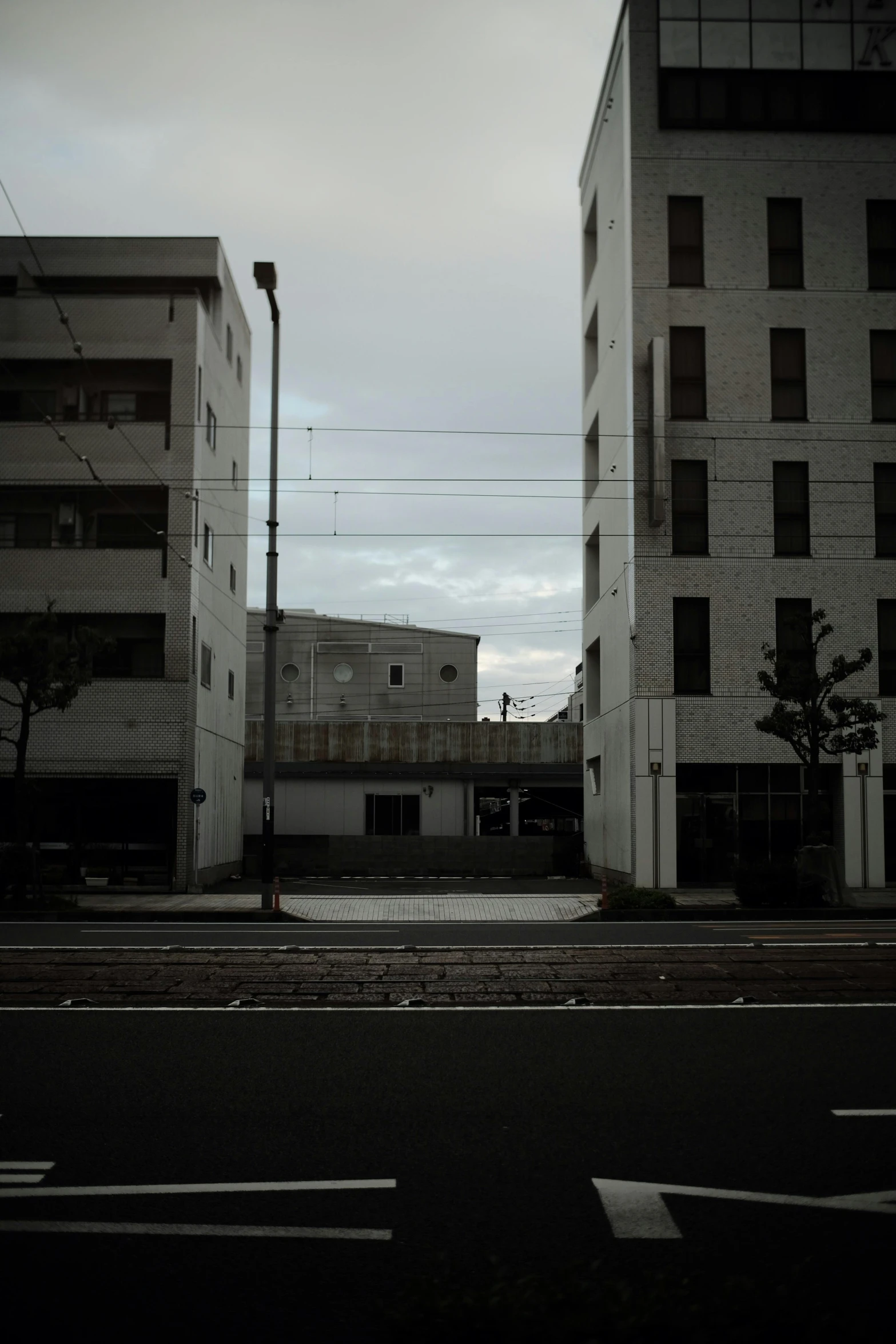 there are two buildings on the other side of the road