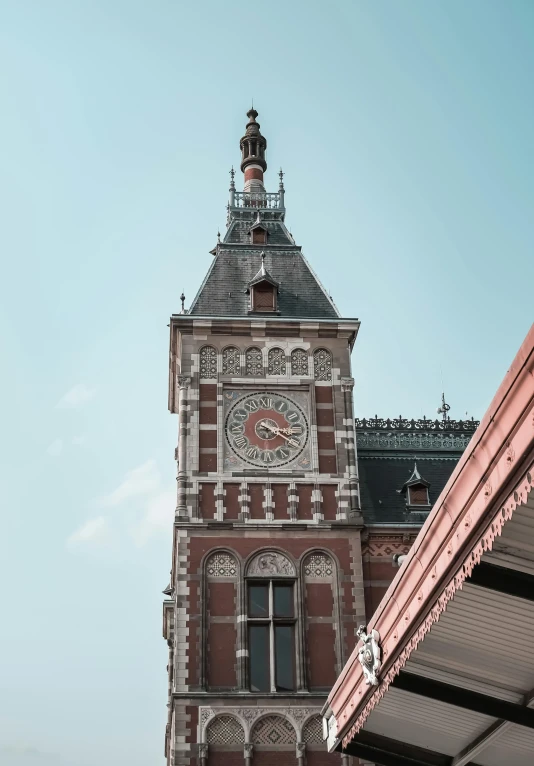 the top of a very large building with a clock