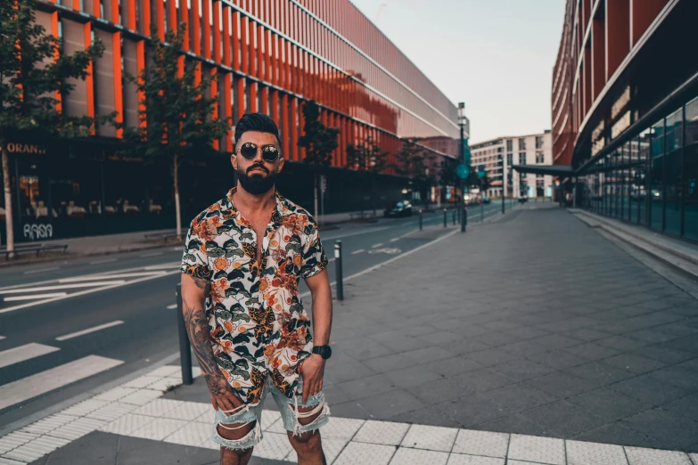 a man is standing on a street corner