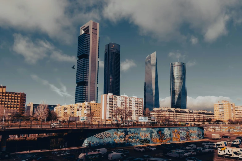 an urban city under construction with overhanging buildings