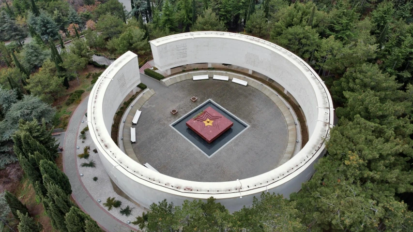 the circular design has two benches around it