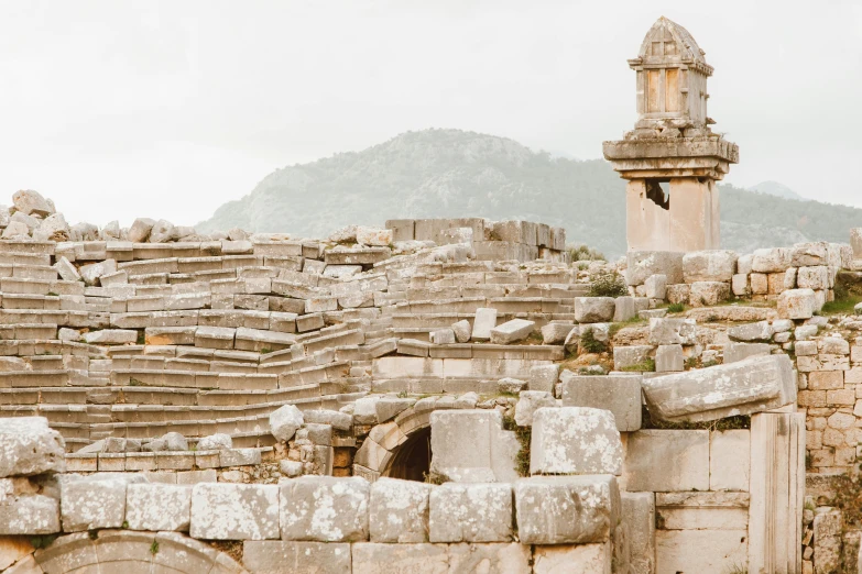 the ruins at a roman city with two stone tower