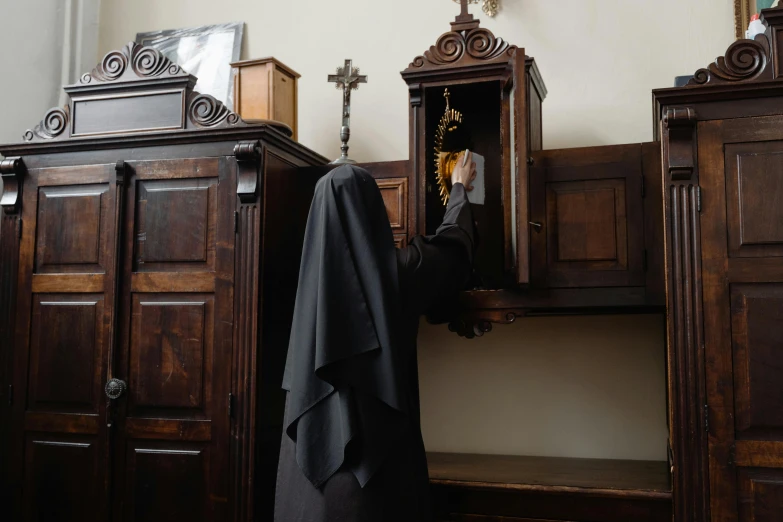 a wooden church with a wooden cross in the corner